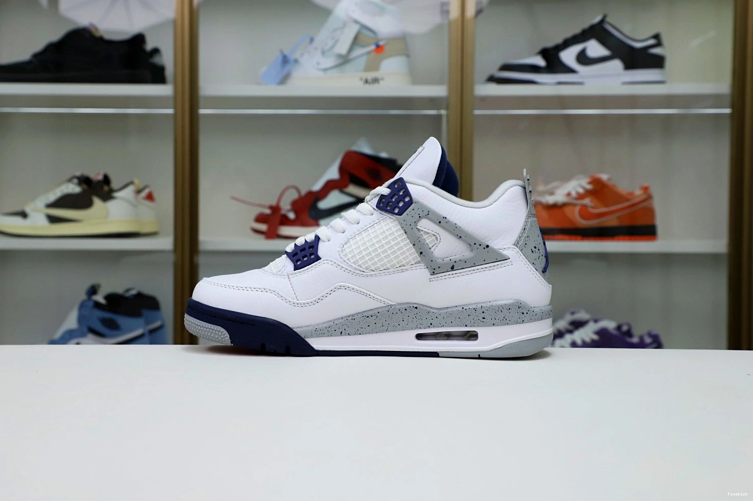 JORDAN 4 RETRO NAVY
